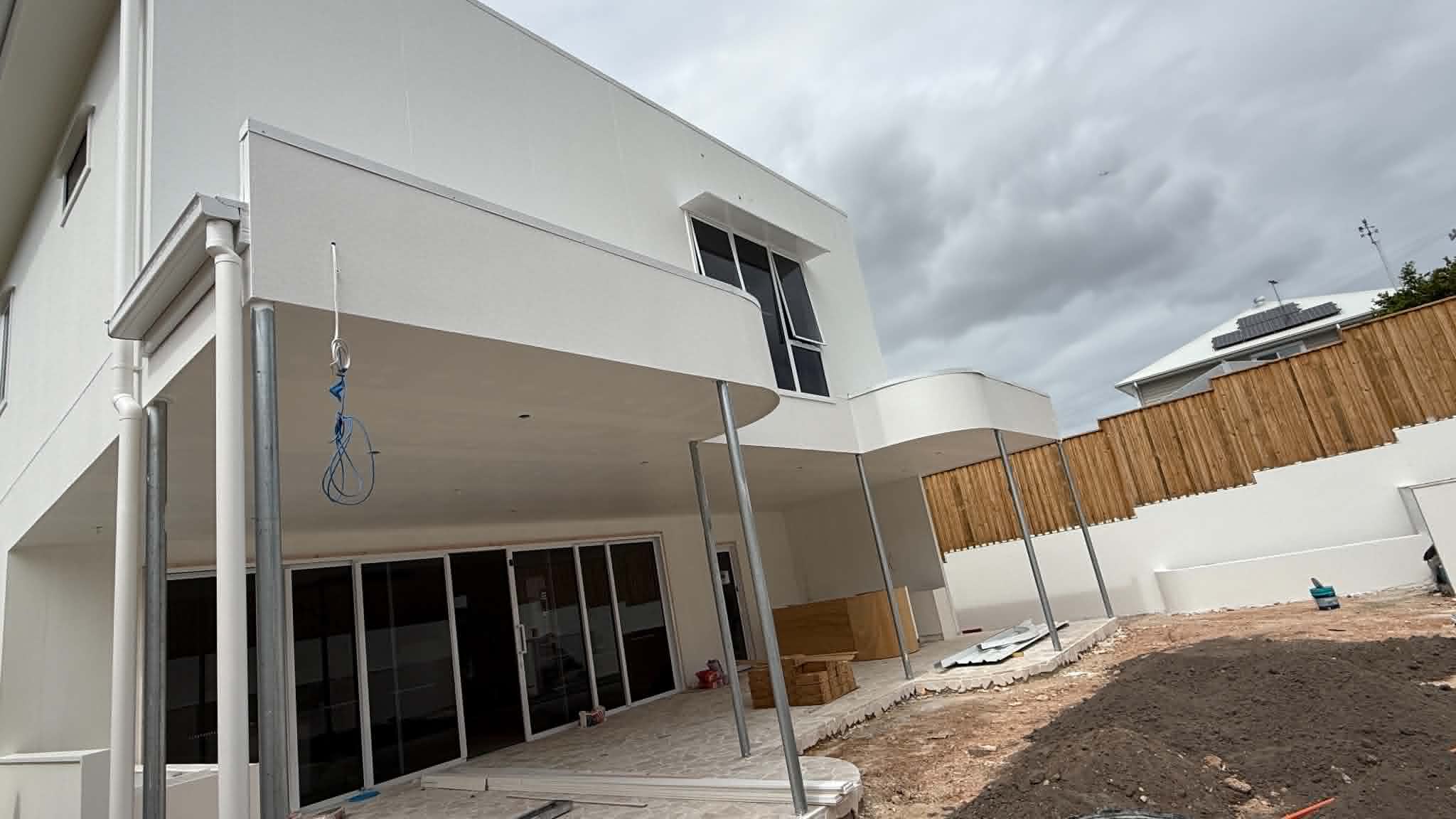Residential exterior house wall painting and weatherboard restoration