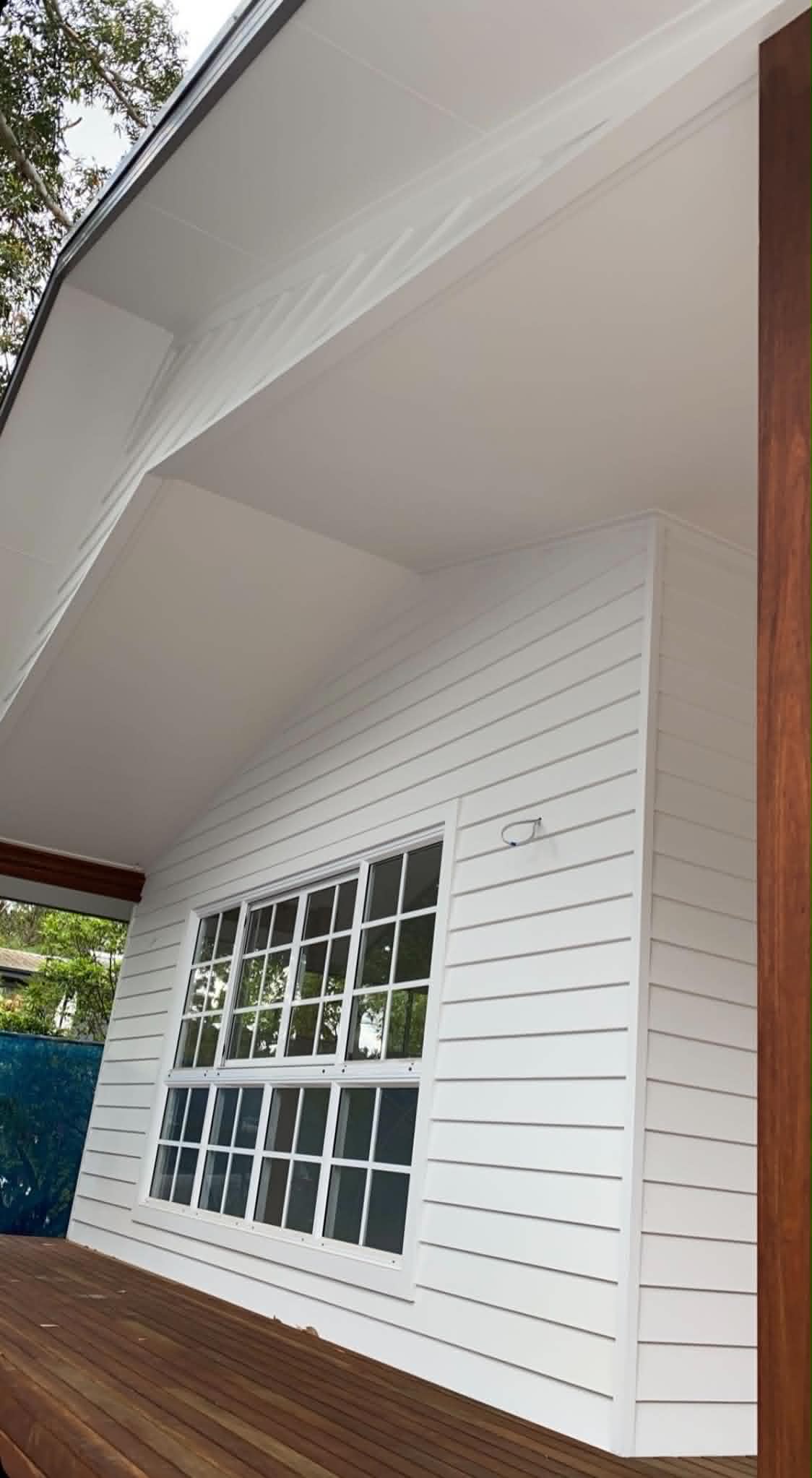 Architectural white exterior cladding painting on modern home in Ripley