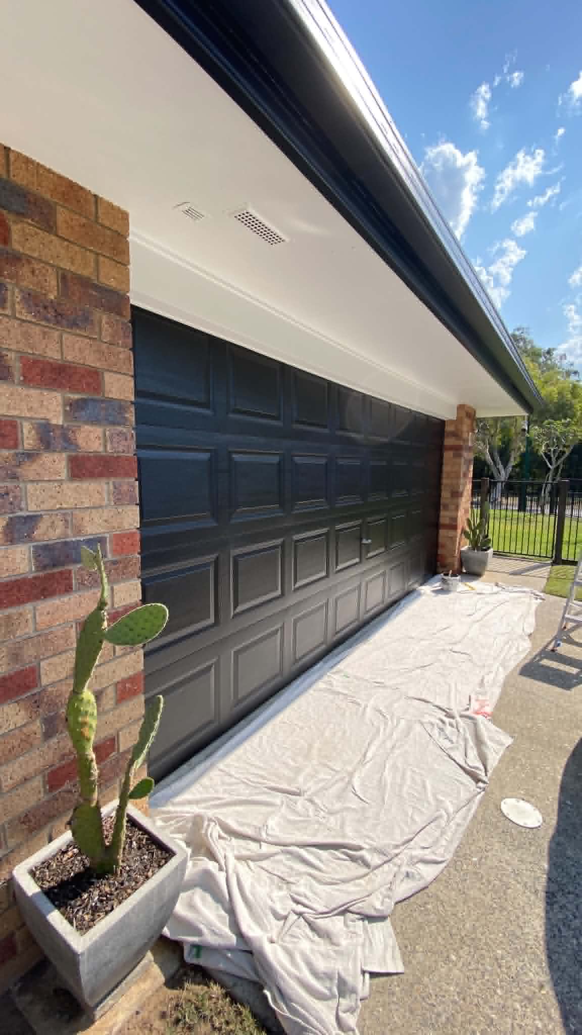 Exterior garage facade and eaves painting in Carindale
