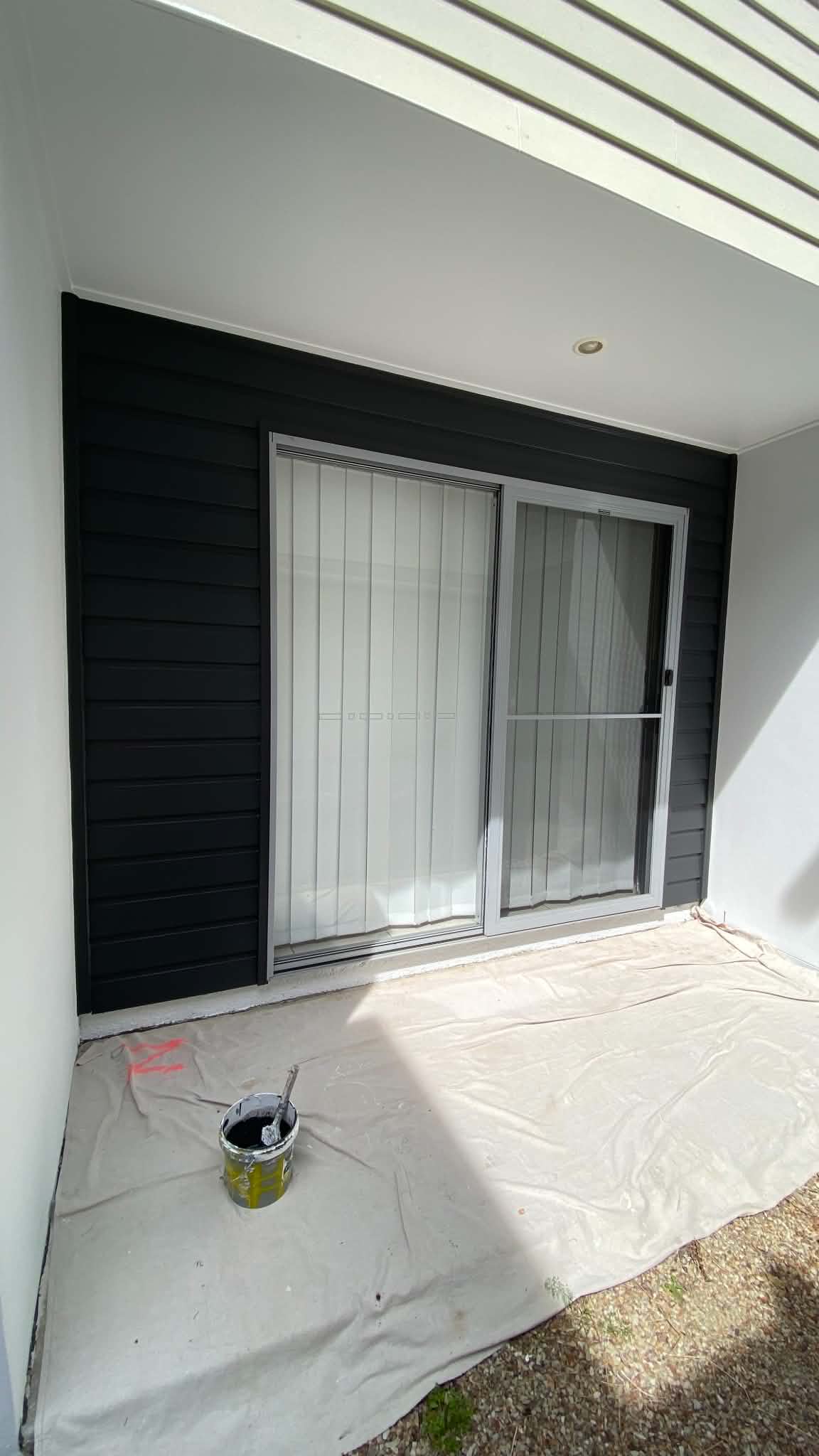 Precision sliding door timber frame and trim enamel painting in Southport